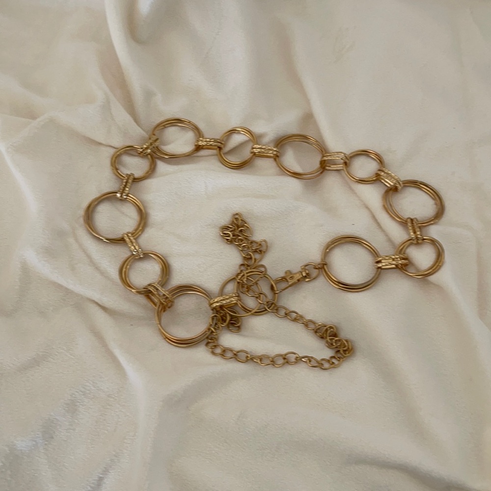 Belt size small . Color gold